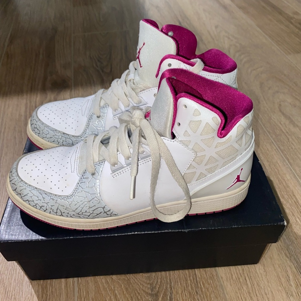 Jordan’s white and pink trainers